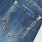 Slitna capris-jeans med upprullad fåll