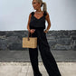 Ärmlös jumpsuit med vida ben för kvinnor