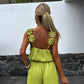 Ärmlös jumpsuit med vida ben för kvinnor