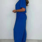V-ringad enfärgad jumpsuit med lös midja för kvinnor