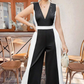 Elegant svartvit ärmlös jumpsuit med V-ringning och vida ben i kontrastfärger