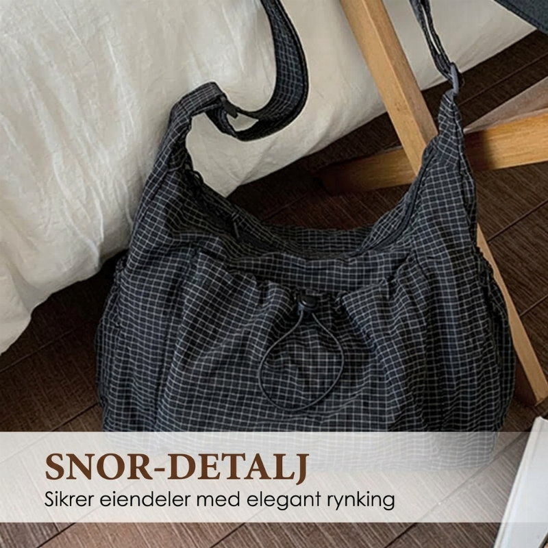 Rutet trekkveske i skyform med snøring og rynker