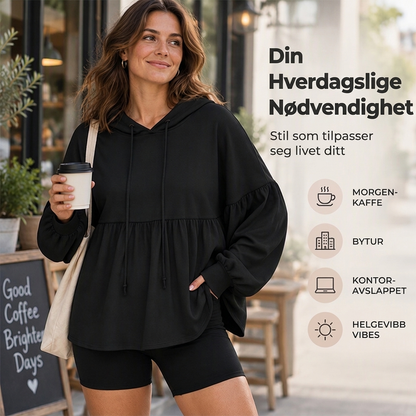 Løs hettegenser til kvinner med volangkant